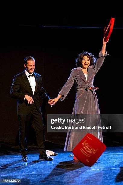 Actors Nicolas Duvauchelle and Fanny Ardant during the traditional throw of cushions at the final greeting of 'Des journees entieres dans les arbres'...