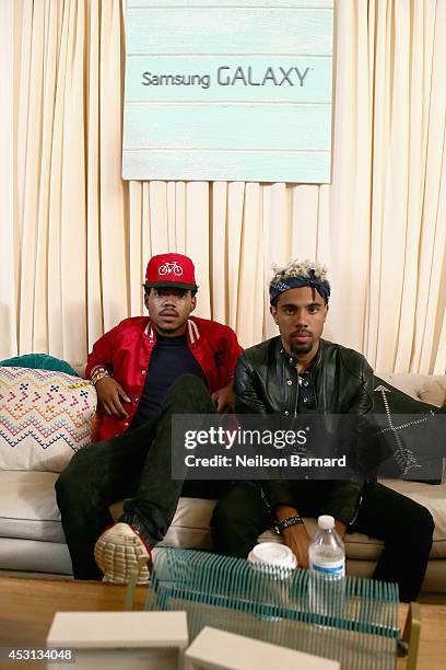 Chance The Rapper and Vic Mensa at the Samsung Galaxy Artist Lounge at Lollapalooza at Grant Park on August 3, 2014 in Chicago, Illinois.