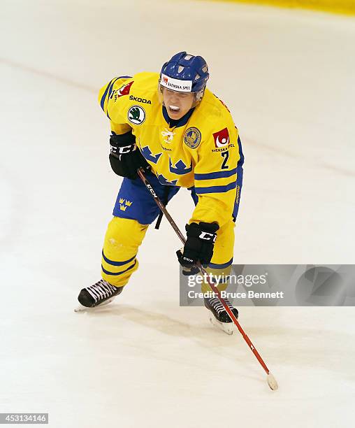 Sebastien Aho of Team Sweden skates against USA White during the 2014 USA Hockey Junior Evaluation Camp at the Lake Placid Olympic Center on August...