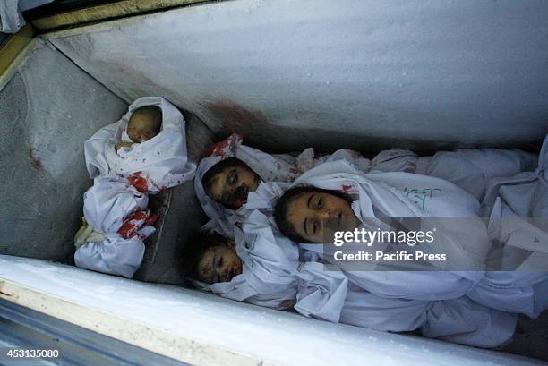 Picture of the child casualties at the morgue in Rafah in the Southern Gaza Strip in an ice-cream freezer, who died along with other members of...