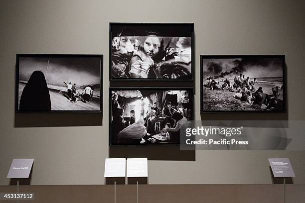Photographs taken by Paolo Pellegrin displayed at Venaria Royal Palace in a photo exhibition called, "A Eyes Open. When the story stopped in a...