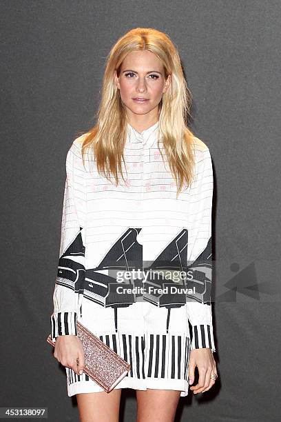 Poppy Delevingne attends the British Fashion Awards 2013 at London Coliseum on December 2, 2013 in London, England.