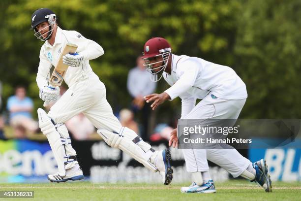 Aaron Redmond of New Zealand sets off for a run during day one of the first test match between New Zealand and the West Indies at University Oval on...