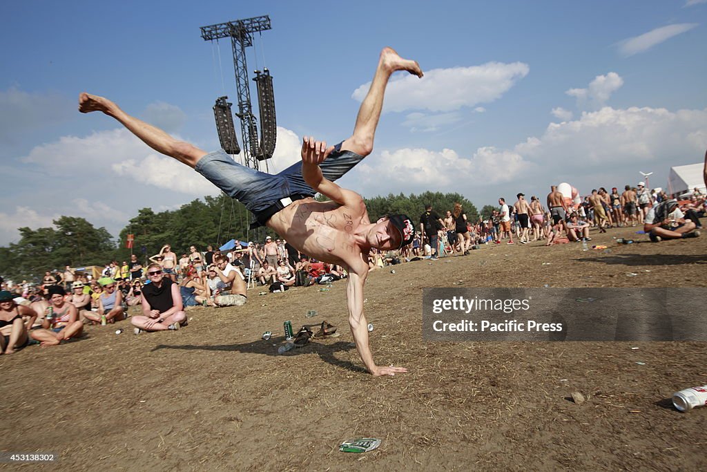 Visitors join during the third day of a so called "Woodstock...