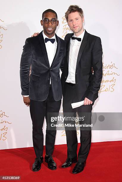 Tinie Tempah and Christopher Bailey poses in the winners room at the British Fashion Awards 2013 at London Coliseum on December 2, 2013 in London,...
