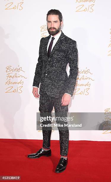 Jack Guinness poses in the winners room at the British Fashion Awards 2013 at London Coliseum on December 2, 2013 in London, England.