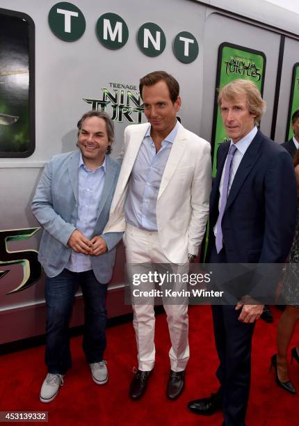 Paramount Film Group President Adam Goodman, actor Will Arnett and producer Michael Bay attend the premiere of Paramount Pictures' "Teenage Mutant...