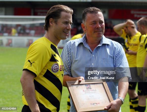 Lars Ricken receiving a Sheffield FC lifetime membership by chairman ...