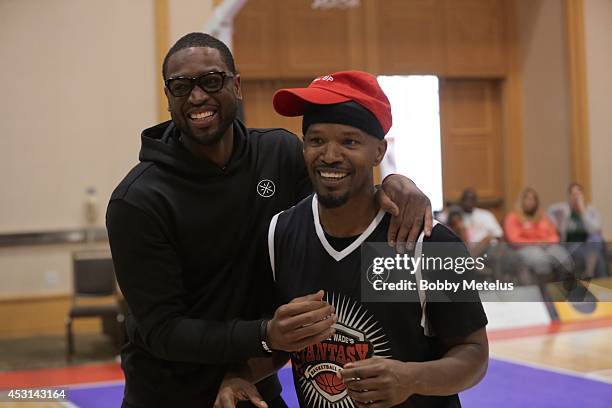 Dwyane Wade and Jamie Foxx after the championship game at Dwyane Wade's Fourth Annual Fantasy Basketball Camp at Westin Diplomat on August 3, 2014 in...