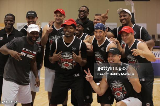 Jamie Foxx and Dwyane Wade during championship photos at Dwyane Wade's Fourth Annual Fantasy Basketball Camp at Westin Diplomat on August 3, 2014 in...