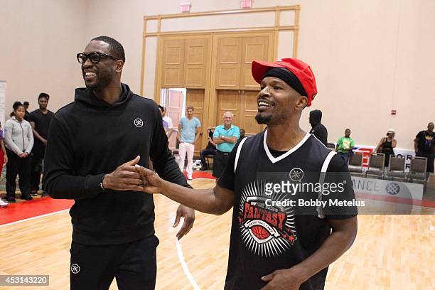 Dwyane Wade and Jamie Foxx after the championship game at Dwyane Wade's Fourth Annual Fantasy Basketball Camp at Westin Diplomat on August 3, 2014 in...