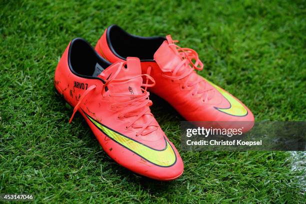 Footbball shoes of Matt Jarvis of West Ham United lie on the pitch prior to the match between FC Malaga and West Ham United as part of the Schalke 04...