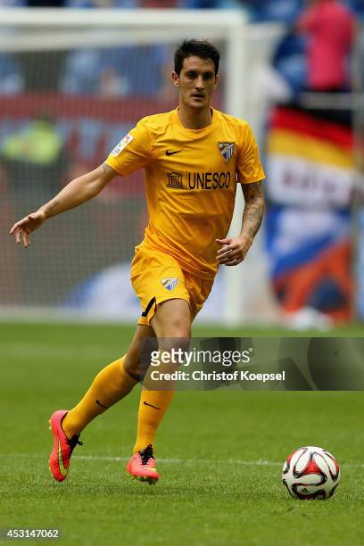 Luis Alberto of Malaga runs with the ball during the match between FC Malaga and West Ham United as part of the Schalke 04 Cup Day at Veltins-Arena...