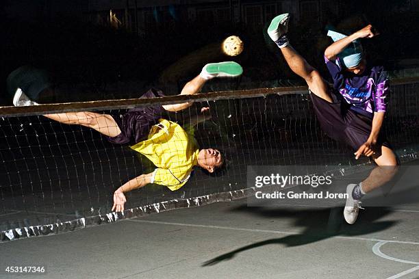 Thais playing sepak takraw.