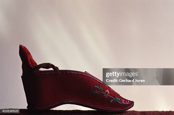 1930s Chinese shoe, made for women with bound feet. Foot binding began in China during the Song dynasty and continued until the end of the Qing...