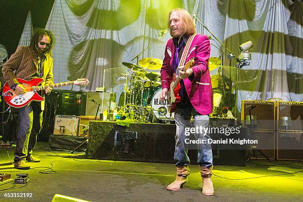 Musicians Mike Campbell and Tom Petty perform on stage with Tom Petty & The Heartbreakers at Viejas Arena on August 3, 2014 in San Diego, California.