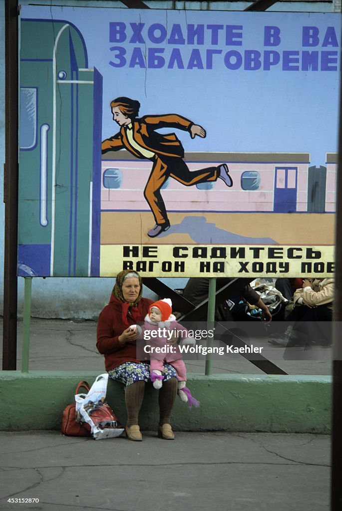 Russia, Siberia, People Waiting At Train Station...