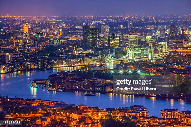 London skyline at dusk seen from One Canada Square Tower aka Canary Wharf.