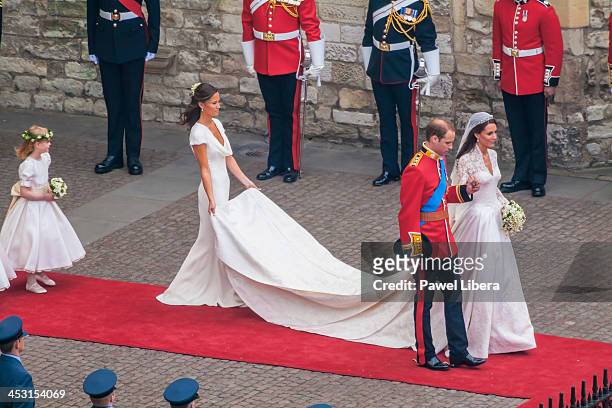 Newlywed couple HRH Prince William of Wales and his wife Catherine leaving Westminster Abbey after the end of the Royal Wedding Ceremony.