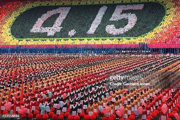Celebration of Kim Il Sung's 80th birthday at Kim Il Sung Stadium in Pyongyang. Years of rigorous training by 40,000 students created a strange but...