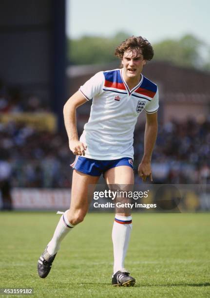 England player Glenn Hoddle in action against Wales at the Racecourse Ground during a Home International match between Wales and England on May 17,...