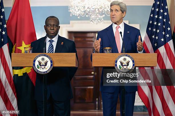 Angola Vice President Manuel Vicente and U.S. Secretary of State John Kerry deliver brief remarks to the news media before a bilateral meeting during...