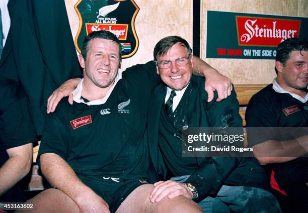 New Zealand all blacks captain Sean Fitzpatrick and coach John Hart celebrate after the 2nd Test match between South Africa springboks and New...