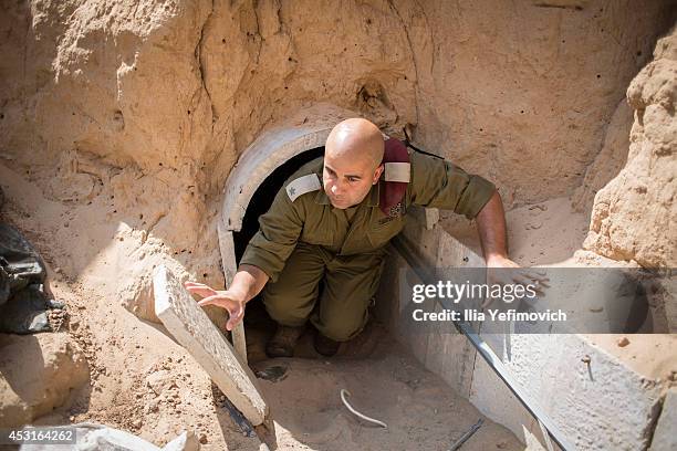 Israeli soldier seen inside a tunnel built underground by Hamas militants leading from the Gaza Strip into Southern Israel, seen on August 4, 2014...