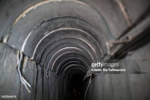 Israeli soldier seen inside a tunnel built underground by Hamas militants leading from the Gaza Strip into Southern Israel, seen on August 4, 2014...