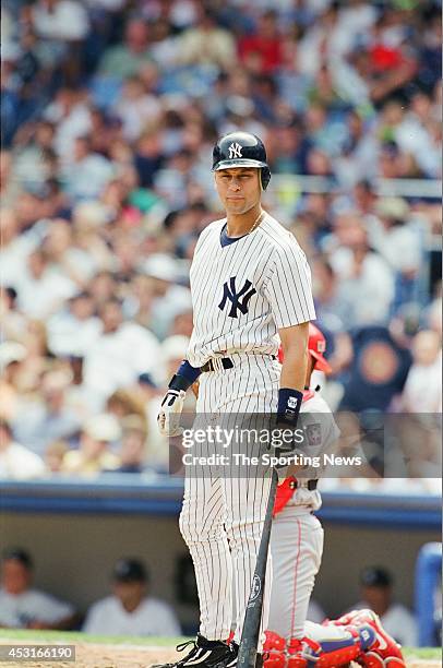 Luis Sojo of the New York Yankees bats against the Texas Rangers at Yankee Stadium on August 15, 1998 in the Bronx borough of New York City.