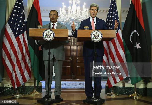 Prime Minister of Libya Abdullah al-Thinni and U.S. Secretary of State John Kerry make remarks to members of the media before a bilateral meeting...