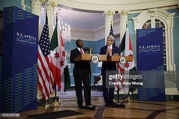 President of Burundi Pierre Nkurunziza and U.S. Secretary of State John Kerry enter the Treaty Room for making remarks to members of the media before...