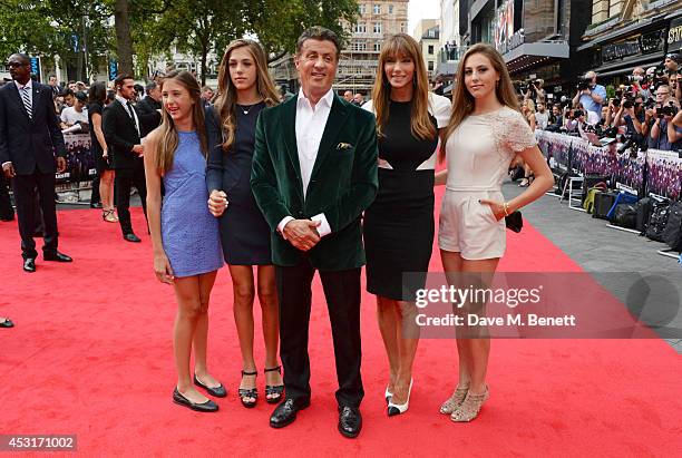 Sylvester Stallone poses with wife Jennifer Flavin and daughters Scarlet, Sophia and Sistine attend the World Premiere of "The Expendables 3" at...
