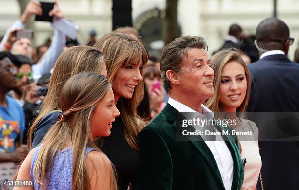 Sylvester Stallone poses with wife Jennifer Flavin and daughters Scarlet, Sophia and Sistine attend the World Premiere of "The Expendables 3" at...