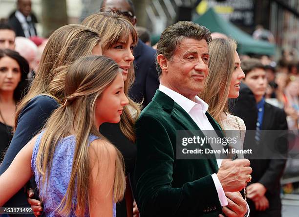 Sylvester Stallone poses with wife Jennifer Flavin and daughters Scarlet, Sophia and Sistine attend the World Premiere of "The Expendables 3" at...