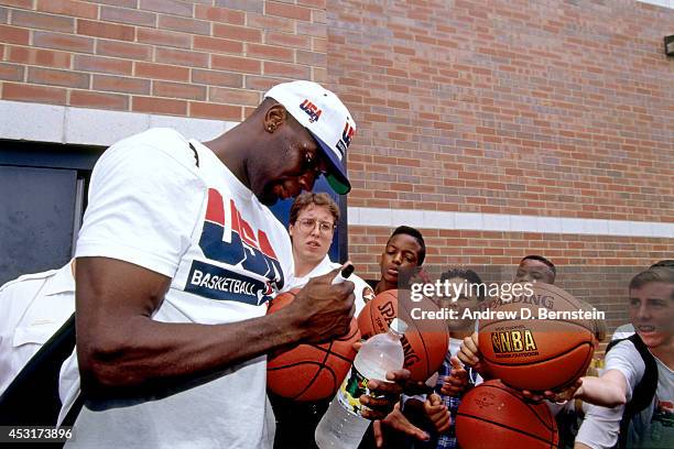 Shawn Kemp of the USA Men's National Team signs autographs for fans in 1994 at the Solheim Center of the Moody Bible Institute in Chicago, Illinois....