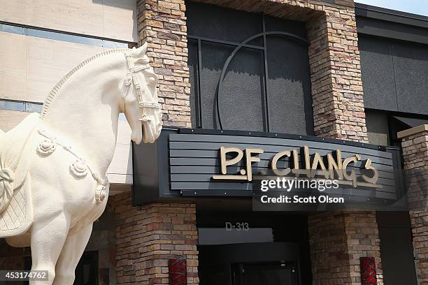 Statue of a horse stands at the entrance to a P.F. Chang's restaurant on August 4, 2014 in Schaumburg, Illinois. P.F. Chang's China Bistro Ltd. Said...