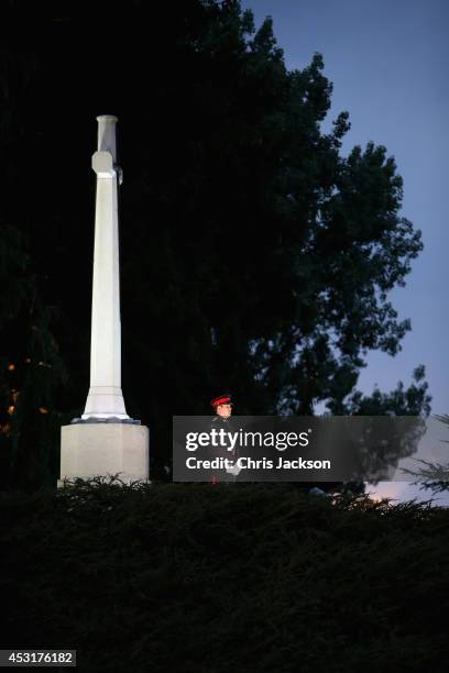 Lone soldier stands under a memorial at St Symphorien Military Cemetery on August 4, 2014 in Mons, Belgium. Monday 4th August marks the 100th...