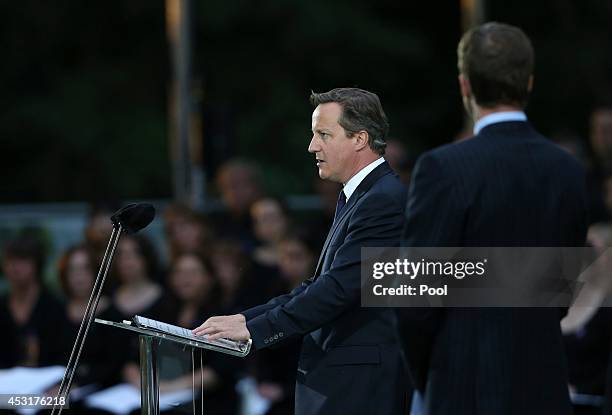 British Prime Minister David Cameron delivers a speech during a ceremony at St Symphorien Military Cemetery on August 4, 2014 in Mons, Belgium....