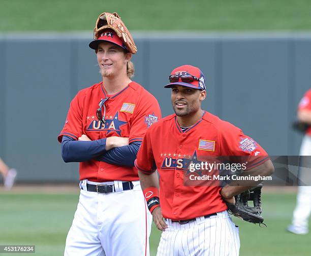 Boston Red Sox prospect Henry Owens and Chicago White Sox prospect Micah Johnson of Team USA look on prior to the 2014 SiriusXM All-Star Futures Game...