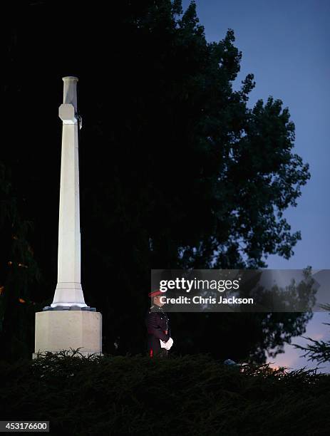 Lone soldier stands under a memorial at St Symphorien Military Cemetery on August 4, 2014 in Mons, Belgium. Monday 4th August marks the 100th...