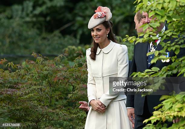 Catherine, Duchess of Cambridge looks at war graves at St Symphorien Military Cemetery on August 4, 2014 in Mons, Belgium. Monday 4th August marks...