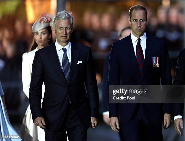 King Philippe of Belgium and Prince William, Duke of Cambridge attend a ceremony at St. Symphorien Military Cemetery on August 4, 2014 in Mons,...