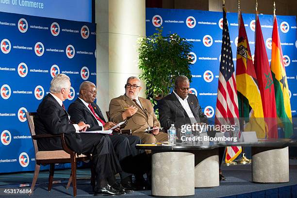 Michael Ducker, vice chairman of U.S. Chamber of Commerce and chief operating officer for FedEx Express Corp., from left, Armando Guebuza, president...