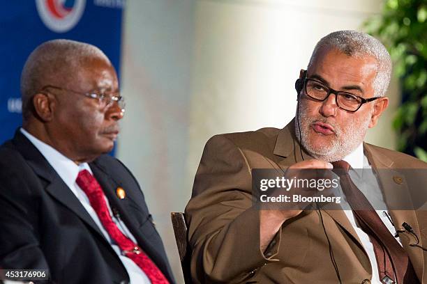 Armando Guebuza, president of Mozambique, left, and Abdelilah Benkirane, prime minister of Morocco, participate in a panel discussion at the U.S....
