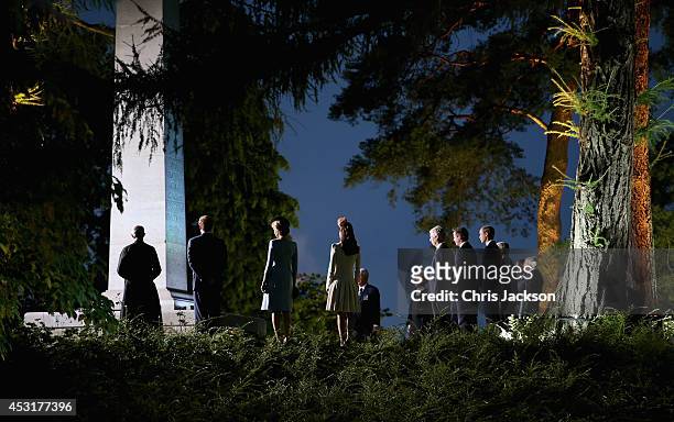 Catherine, Duchess of Cambridge , King Philippe of Belgium, Prime Minister David Cameron and Prince William, Duke of Cambridge pay their respects at...