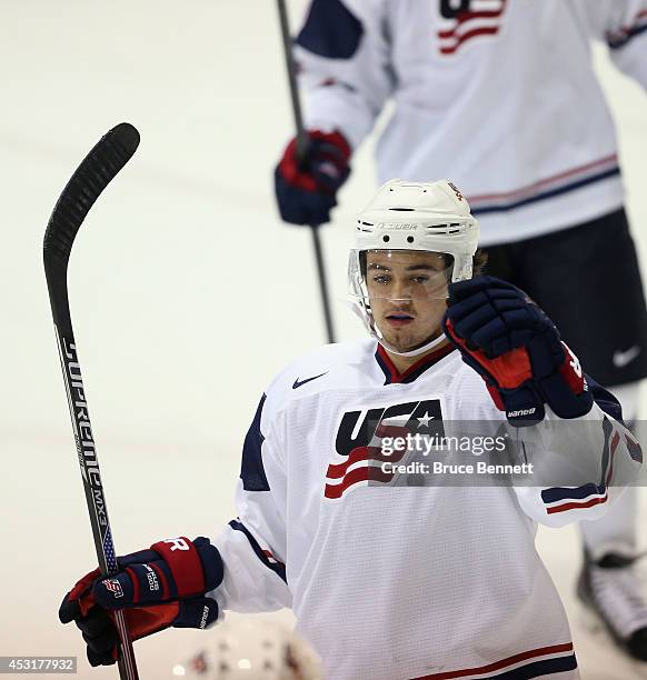 Sonny Milano of USA White celebrates his second period goal against Team Finland during the 2014 USA Hockey Junior Evaluation Campat Lake Placid...