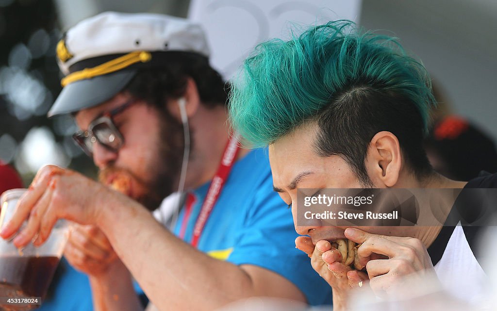Takeru Kobayashi defends his pizza eating title at "Let Them Eat 5" During Kempenfest on the waterfront in Barrie, Ontario, Canada.  Kobayashi ate 62 slices of pizza, (15 and a half 12" pizzas, that weigh about a pound each)