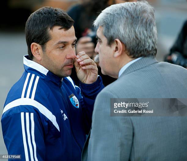 Santiago Capurro coach of Las Leonas talks with Anibal Fernandez President of Argentine Hockey Confederation after a press conference to announce...