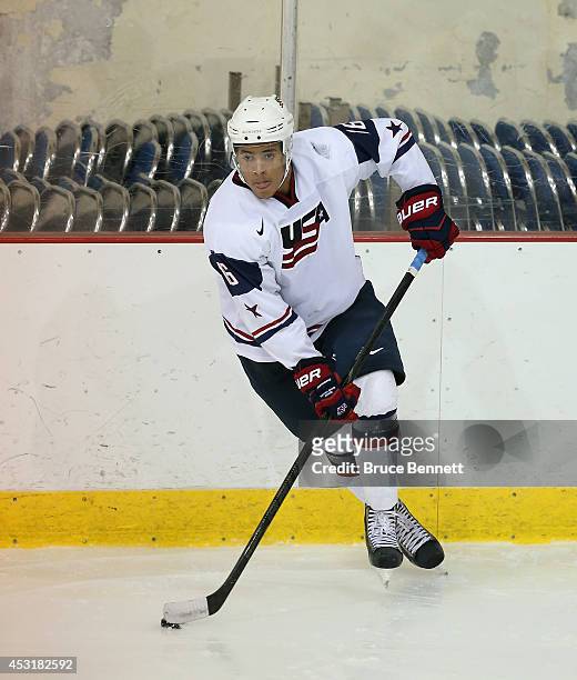 Keegan Iverson of USA White skates against Team Finland during the 2014 USA Hockey Junior Evaluation Camp at the Lake Placid Olympic Center on August...